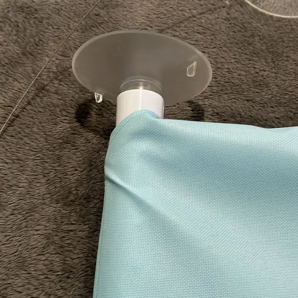 Light blue perch for your cat to put in the window with suction